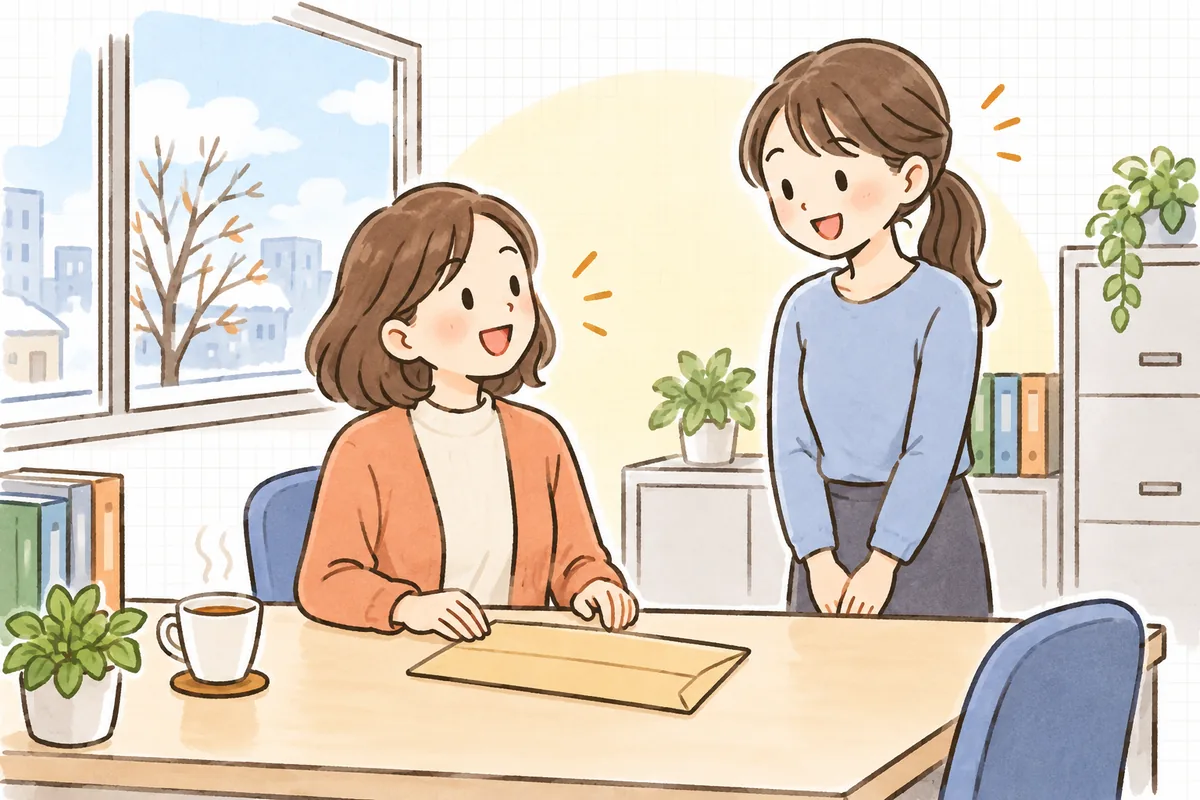 住宅ローン控除の書類を確認し終え、ほっとした笑顔で従業員に「大丈夫でしたよ」と声をかけているひとり経理の担当者