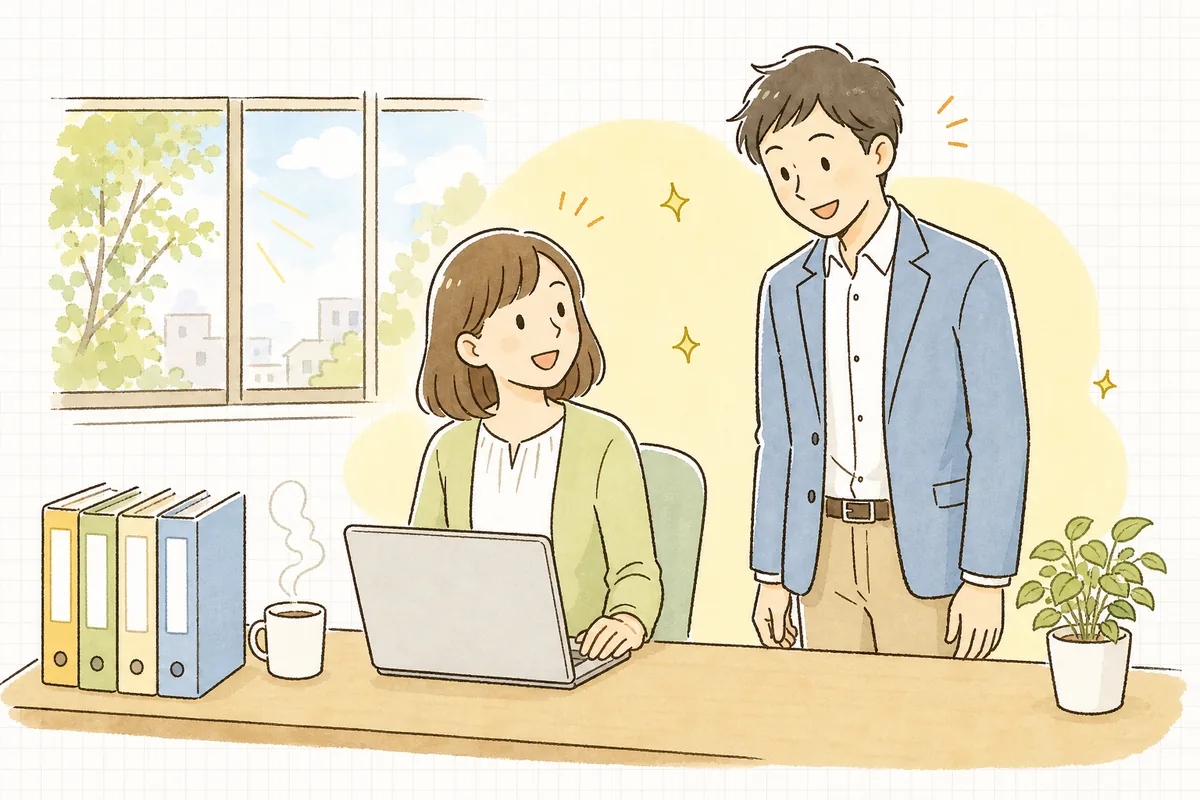 順調に入金が続いている取引先の一覧を確かめながら、営業の同僚と笑顔で話すひとり経理の担当者